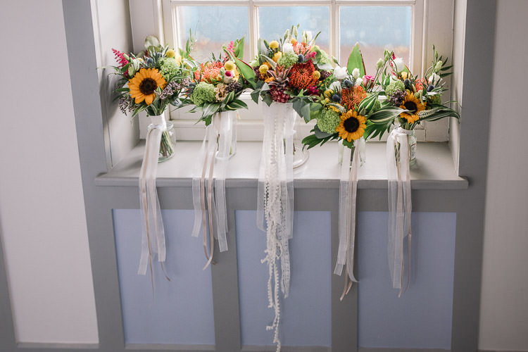 Flowers Bouquet Bride Bridal Yellow Red Sunflower Billy Ball Ribbons Colourful Indie London City Wedding Clissold House West Reservoir Centre https://www.murrayclarke.co.uk/