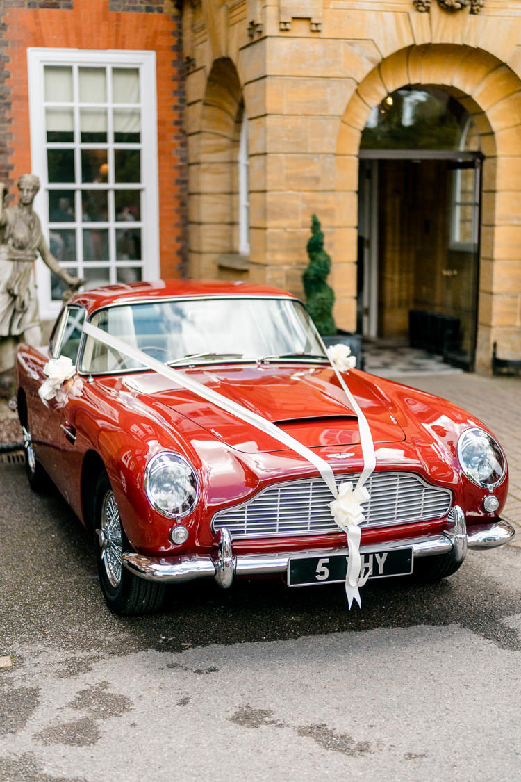 Bride Bridal Transport Vintage Car Nostalgic Honest British Loseley Park Wedding Surrey https://www.johnbarwoodphotography.co.uk/