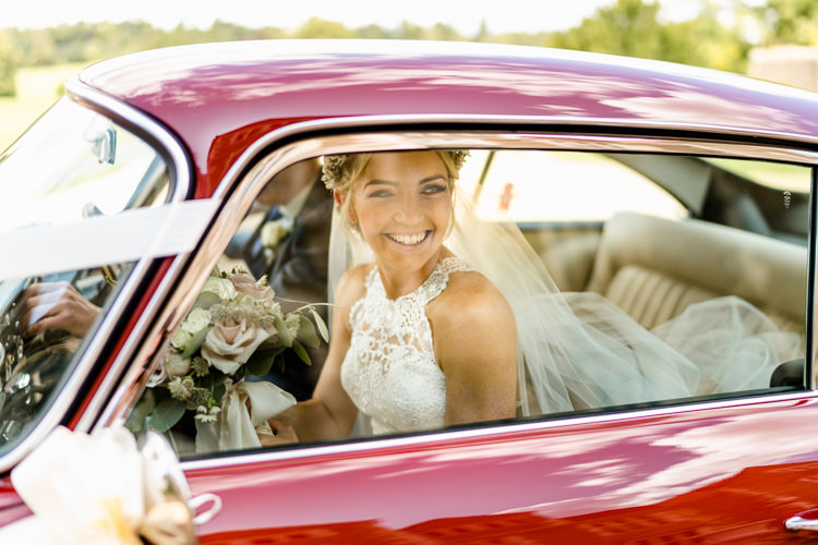 Lace Keyhole Neck Fitted Pronovias Dress Gown Bride Bridal Faux Flower Crown Veil Bouquet Ribbon Vintage Car Travel Transport Nostalgic Honest British Loseley Park Wedding Surrey https://www.johnbarwoodphotography.co.uk/