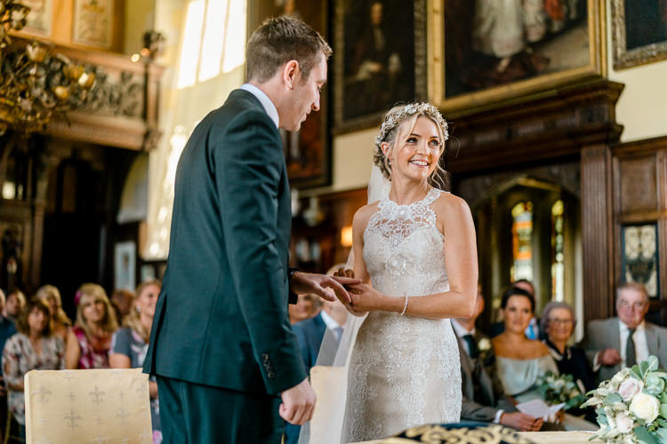 Lace Keyhole Neck Fitted Pronovias Dress Gown Bride Bridal Faux Flower Crown Veil Bouquet Ribbon Bottle Green Reiss Suit Groom Nostalgic Honest British Loseley Park Wedding Surrey https://www.johnbarwoodphotography.co.uk/