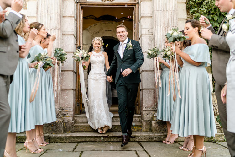 Lace Keyhole Neck Fitted Pronovias Dress Gown Bride Bridal Faux Flower Crown Veil Bouquet Ribbon Reiss Bottle Green Suit Groom Tea Length Bridesmaids Off the Shoulder Bardot Nostalgic Honest British Loseley Park Wedding Surrey https://www.johnbarwoodphotography.co.uk/