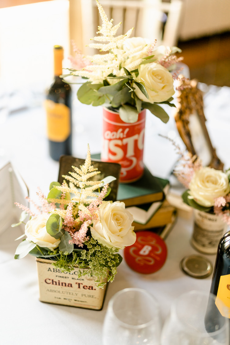 Tea Tin Table Centre Jar Rose Eucalpytus Books Vintage Nostalgic Honest British Loseley Park Wedding Surrey https://www.johnbarwoodphotography.co.uk/