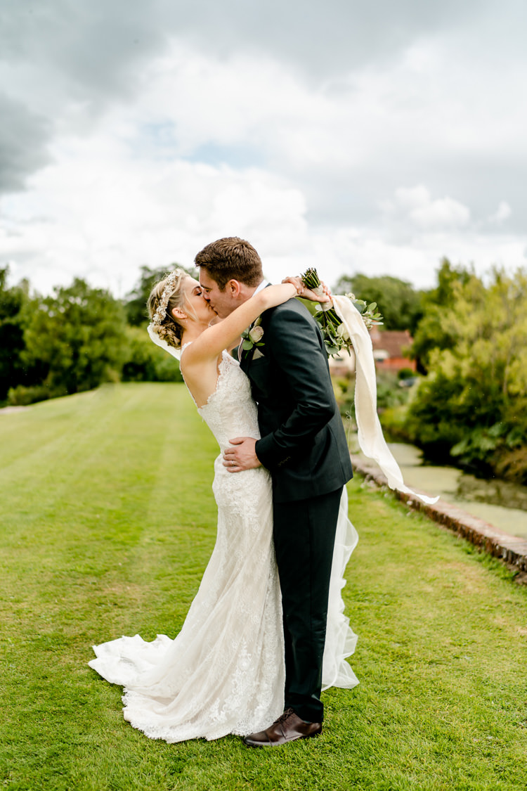Lace Keyhole Neck Fitted Pronovias Dress Gown Bride Bridal Bottle Green Reiss Suit Groom Bouquet Ribbon Nostalgic Honest British Loseley Park Wedding Surrey https://www.johnbarwoodphotography.co.uk/