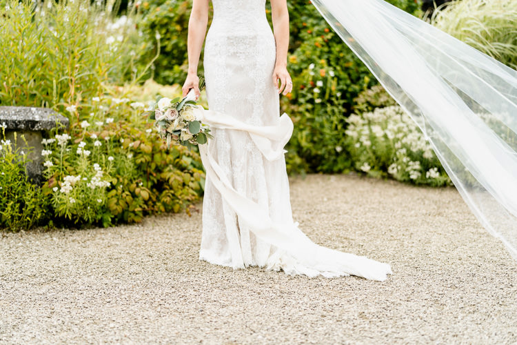 Lace Keyhole Neck Fitted Pronovias Dress Gown Bride Bridal Veil Bouquet Ribbon Nostalgic Honest British Loseley Park Wedding Surrey https://www.johnbarwoodphotography.co.uk/