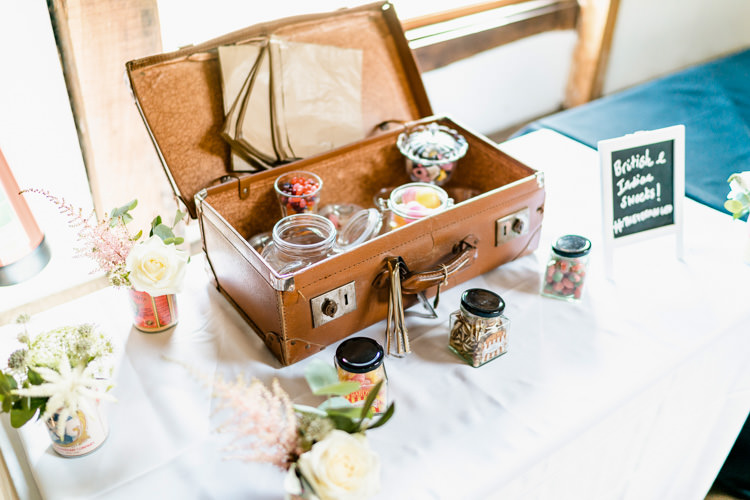 Sweet Station Vintage Suitcase Trunk Jars Table Nostalgic Honest British Loseley Park Wedding Surrey https://www.johnbarwoodphotography.co.uk/