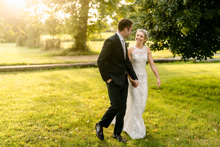 Lace Keyhole Neck Fitted Pronovias Dress Gown Bride Bridal Faux Flower Crown Veil Reiss Groom Bottle Green Suit Nostalgic Honest British Loseley Park Wedding Surrey https://www.johnbarwoodphotography.co.uk/