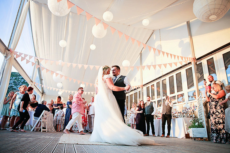 Bride Bridal Dress Gown Lace V Neck Cap Sleeve Pink Peach Bouquet Groom Waistcoat Tweed Grey Flower Foliage Crown Bunting Paper Lanterns First Dance Pretty Sparkly Lusty Glaze Beach Cornwall Wedding http://victoriamitchellphotography.com/