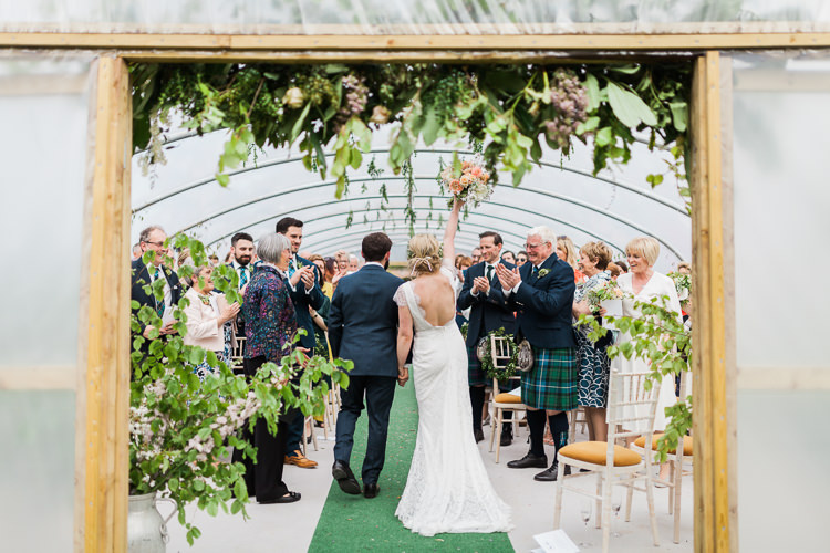 Greenery Foliage Foral Flowers Backless Dress Bride Bridal Gown Ceremony Spring Floral Polytunnel Sunny Wedding Colstoun House Scotland http://solenphotography.co.uk/