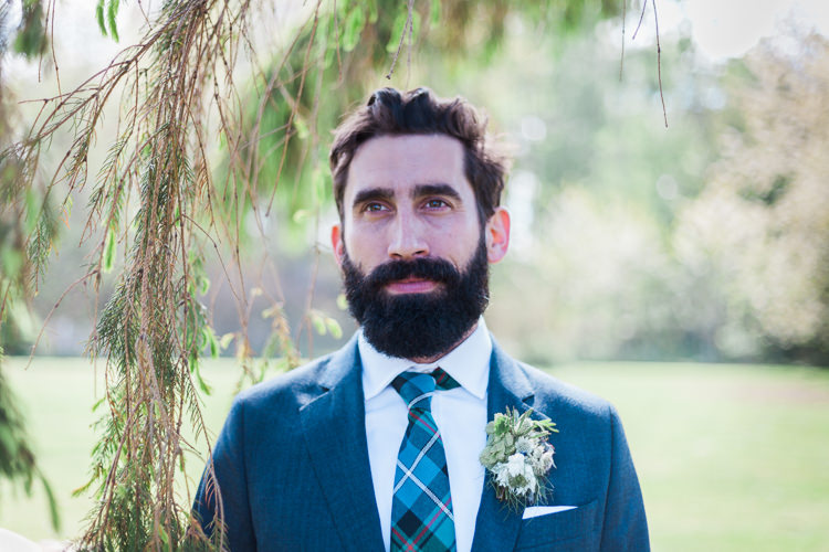 Blue Suit Hackett Groom Tartan Tie Buttonhole Spring Floral Polytunnel Sunny Wedding Colstoun House Scotland http://solenphotography.co.uk/