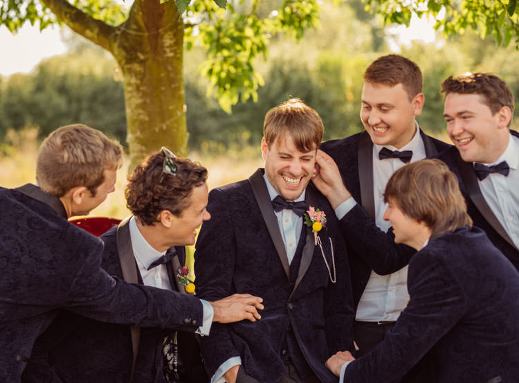 Groom Groomsmen Groomsman Best Man Suits Bow Tie Velvet Bridge House Barn Leicestershire Wedding Colourful DIY Festival Tipi https://bpwphotography.com/