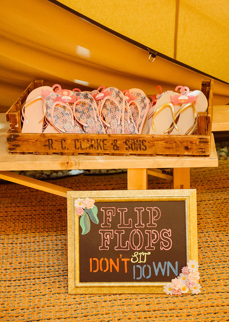 Wooden Flip Flops Blackboard Sign Quote Bridge House Barn Leicestershire Wedding Colourful DIY Festival Tipi https://bpwphotography.com/