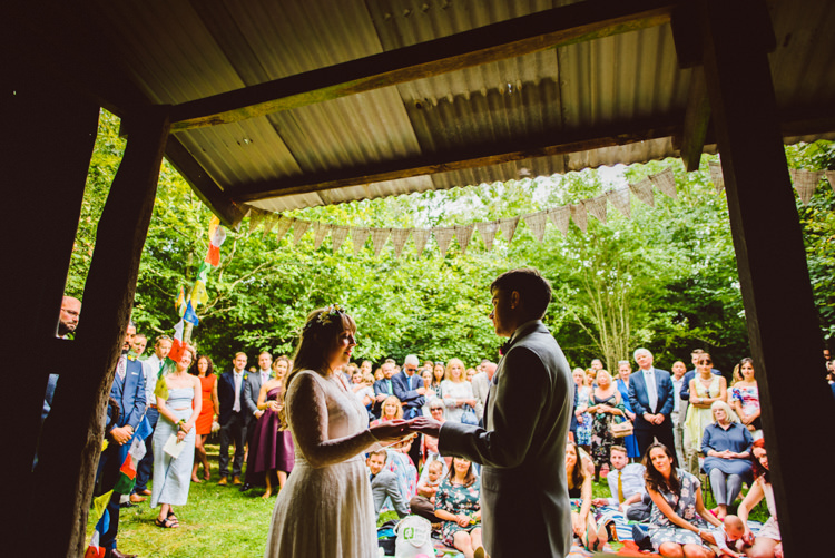 Bride Bridal Lace long Sleeved Dress Gown V Neck Wild Flower Crown Yellow Dip Dye Underskirt Bunting Prayer Flags Woodland Organic Farm Shop Wedding Gloucestershire https://www.edgodden.co.uk/