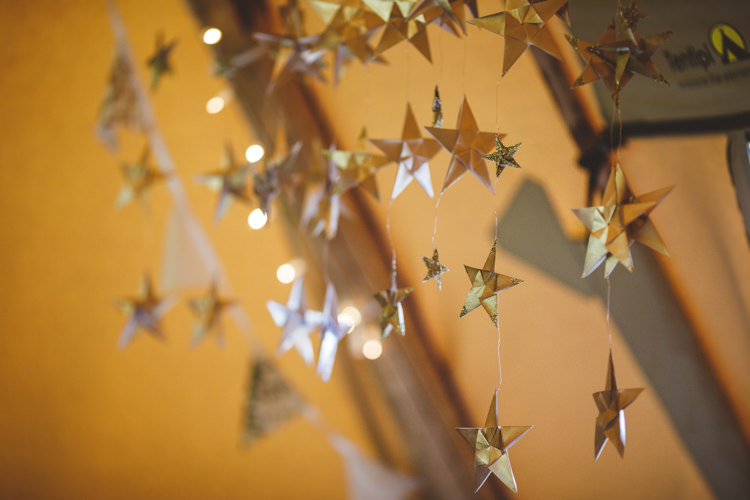 Hanging Gold Stars Relaxed Country Tipi Yellow Wedding Hampshire https://photography34.co.uk/