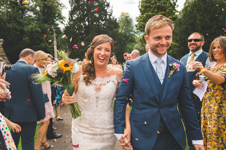 Bride Bridal Sottero & Midgeley Dress Gown Lace Shoulder Detail Richard James Suit Three Piece Waistcoat Blue Groom Confetti Sunflower Bouquet Colourful Outdoor Tipi Farm Wedding https://kirstymackenziephotography.co.uk/