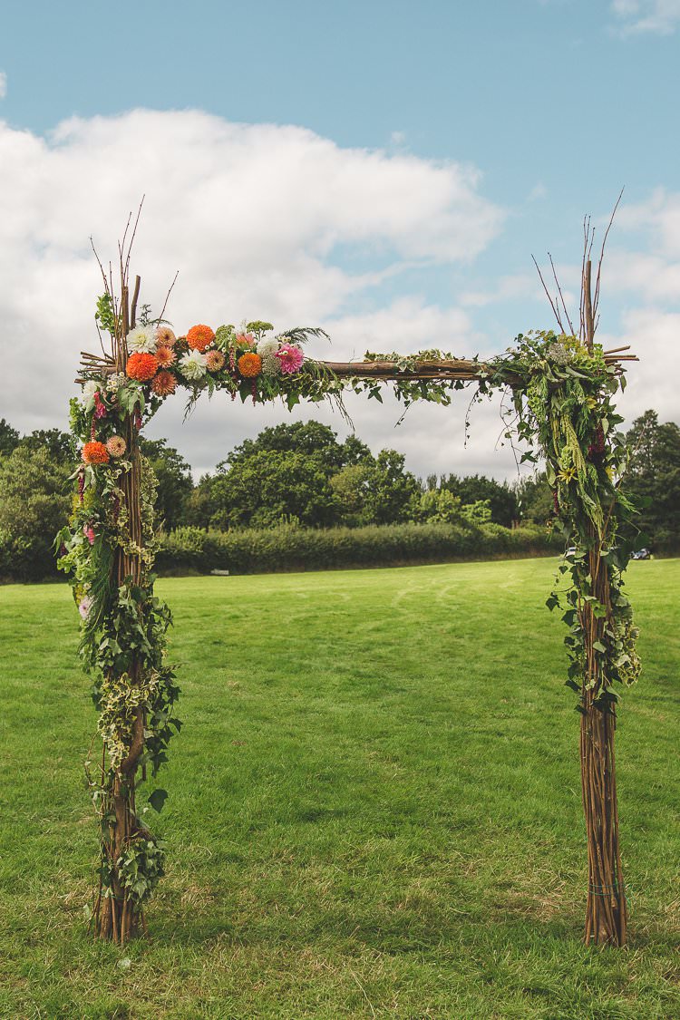 Ceremony Arch Floral Rustic Greenery Foliage Colourful Outdoor Tipi Farm Wedding https://kirstymackenziephotography.co.uk/