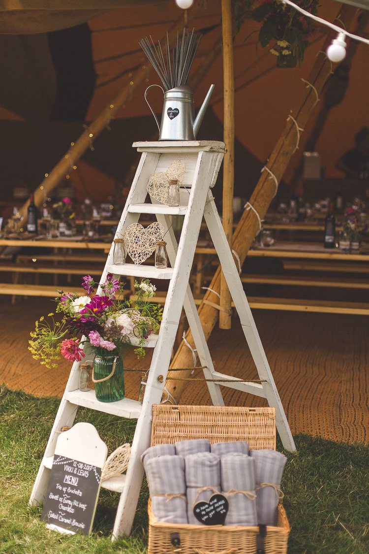 Stepladder Watering Can Sparklers Decor Blankets Colourful Outdoor Tipi Farm Wedding https://kirstymackenziephotography.co.uk/
