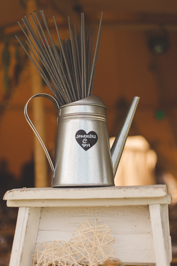 Sparklers Watering Can Steel Metal Colourful Outdoor Tipi Farm Wedding https://kirstymackenziephotography.co.uk/