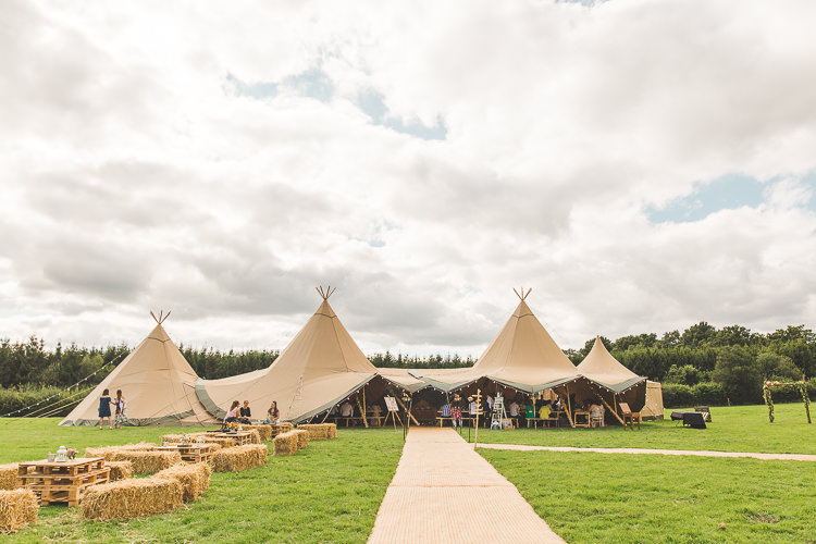 Colourful Outdoor Tipi Farm Wedding https://kirstymackenziephotography.co.uk/