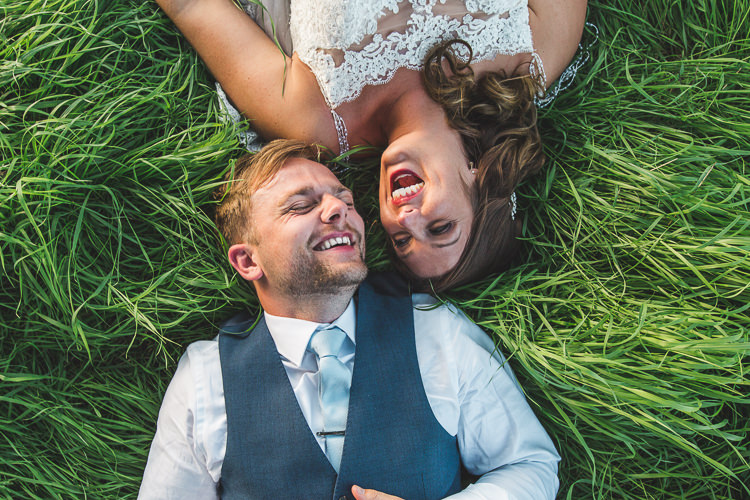 Bride Bridal Sottero & Midgeley Dress Gown Lace Shoulder Detail Richard James Suit Three Piece Waistcoat Blue Groom Colourful Outdoor Tipi Farm Wedding https://kirstymackenziephotography.co.uk/