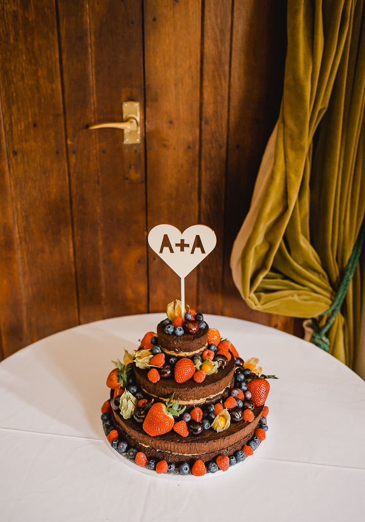 Naked Chocolate Layer Cake Berries Raucous Artistic Wintry Wedding Voewood Norfolk https://www.luisholden.com/
