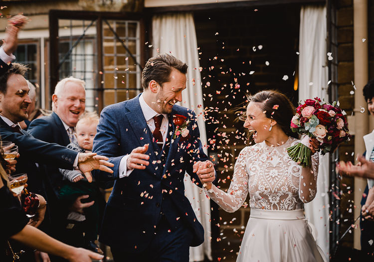 Confetti Throw Raucous Artistic Wintry Wedding Voewood Norfolk https://www.luisholden.com/