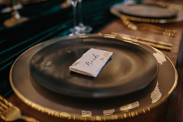 Black Plates Gold Chargers Cutlery Place Names Calligraphy Card Luxe Industrial Velvet Wedding Ideas https://jessypapasavvaphotography.com/
