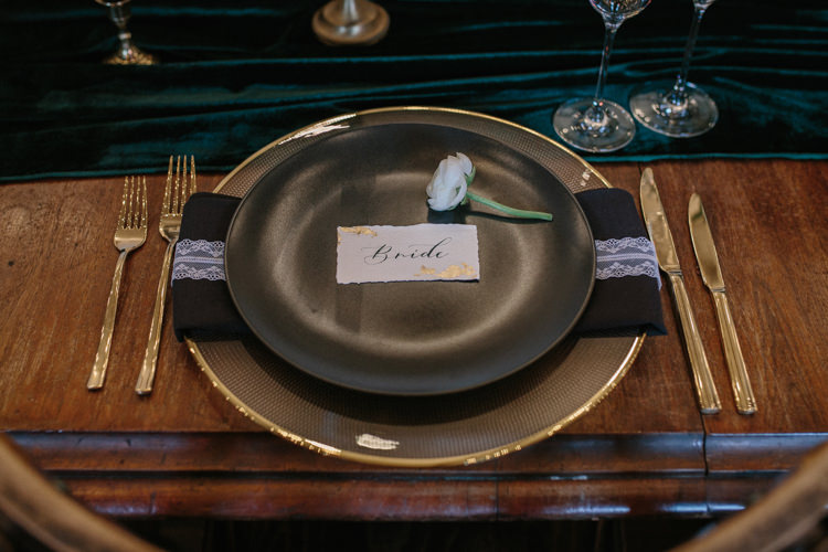 Black Plates Gold Chargers Cutlery Place Names Calligraphy Card Luxe Industrial Velvet Wedding Ideas https://jessypapasavvaphotography.com/