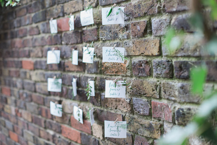 Seating Plan Table Chart Hanging Calligraphy Wall Brick Lush Botanical City Roof Garden Wedding Ideas http://jessicadaviesphotography.co.uk/
