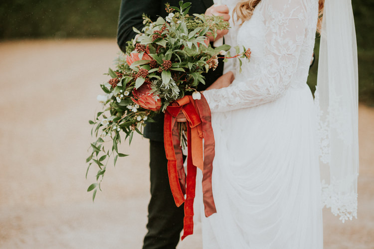 Bouquet Flowers Bride Bridal Red Greenery Ribbon Wild Moody Jewel Tone Velvet Wedding Ideas Sanctum On The Green https://www.hannahmcclunephotography.com/