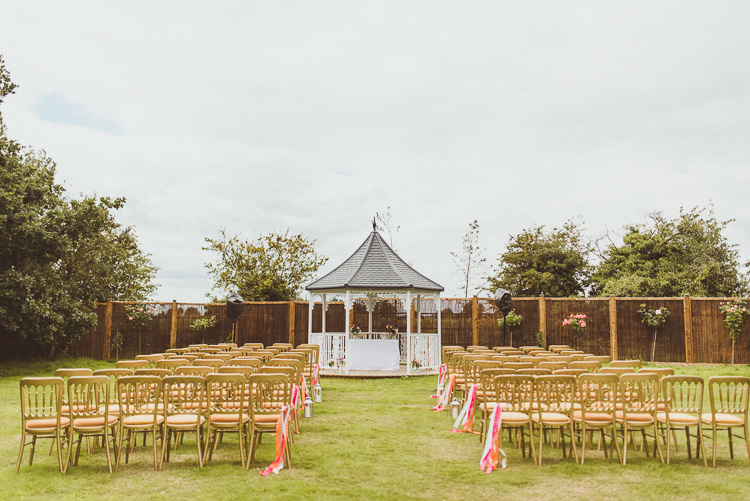 Outdooor Garden Ceremony Colourful Modern Barn Vaulty Manor Essex Wedding http://alexapenberthy.com/