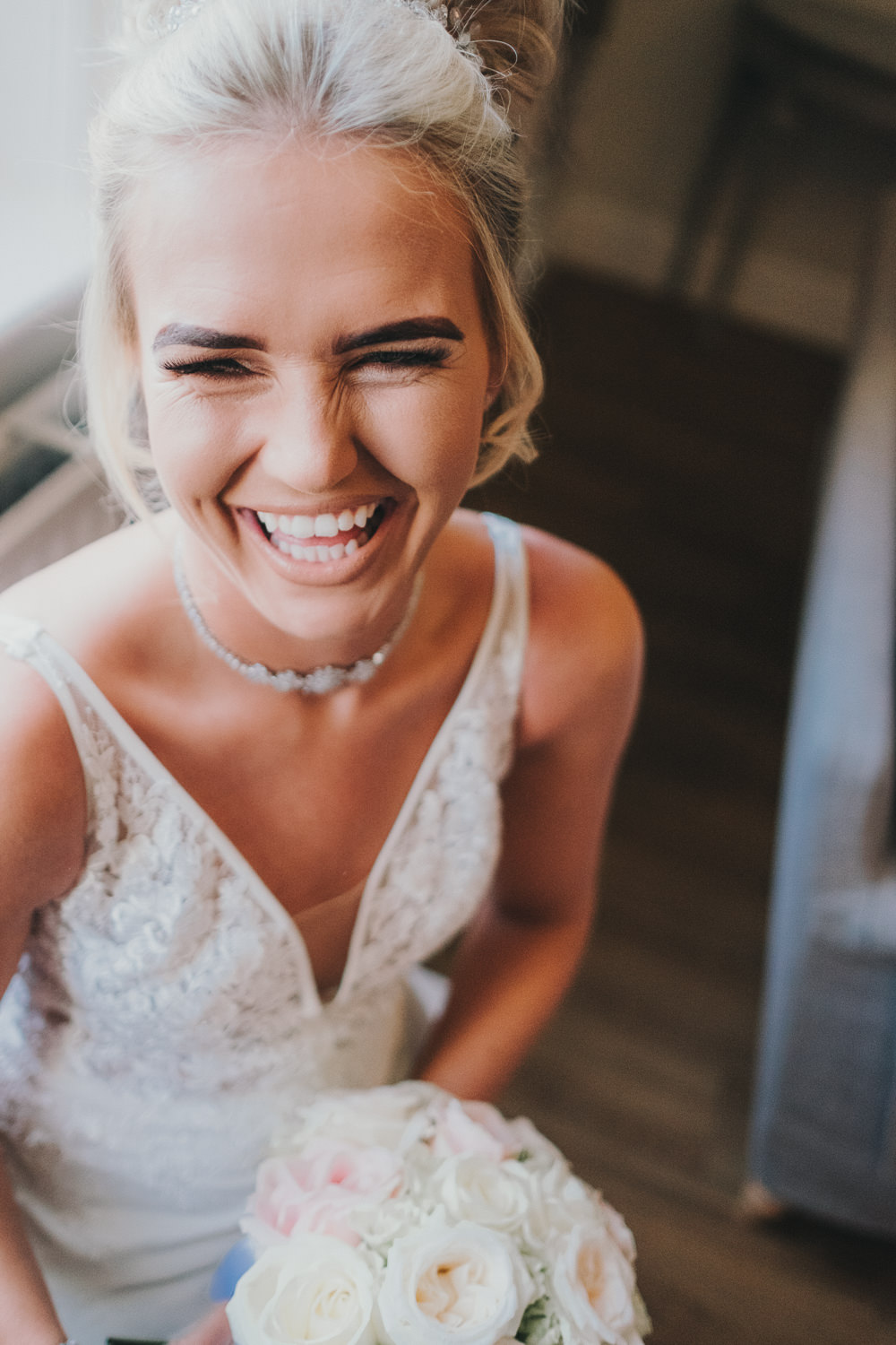 Happy Bride Bridal Prep Morning Hair Updo Classic Traditional Elegant Round White Rose Bouquet | Ashfield House Wedding Kate McCarthy Photography