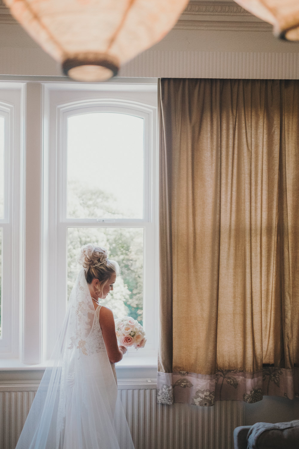 Bride Bridal Prep Morning Hair Updo Classic Traditional Elegant Round White Rose Bouquet | Ashfield House Wedding Kate McCarthy Photography