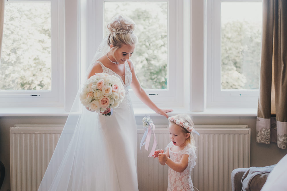 Happy Bride Bridal Prep Morning Hair Updo Classic Traditional Elegant Round White Rose Bouquet Pink Flower Girl | Ashfield House Wedding Kate McCarthy Photography
