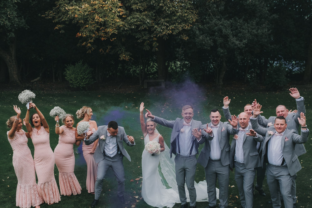 Bride Groom Bridesmaids Groomsmen Group Purple Smoke Bomb Classic Traditional Elegant Fun | Ashfield House Wedding Kate McCarthy Photography