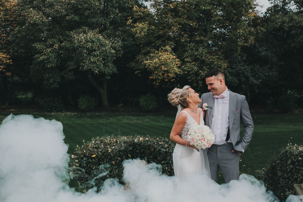Bride Groom Happy Laughter Classic Traditional Bouquet Bridal Updo Grey Suit White Smoke Bomb | Ashfield House Wedding Kate McCarthy Photography