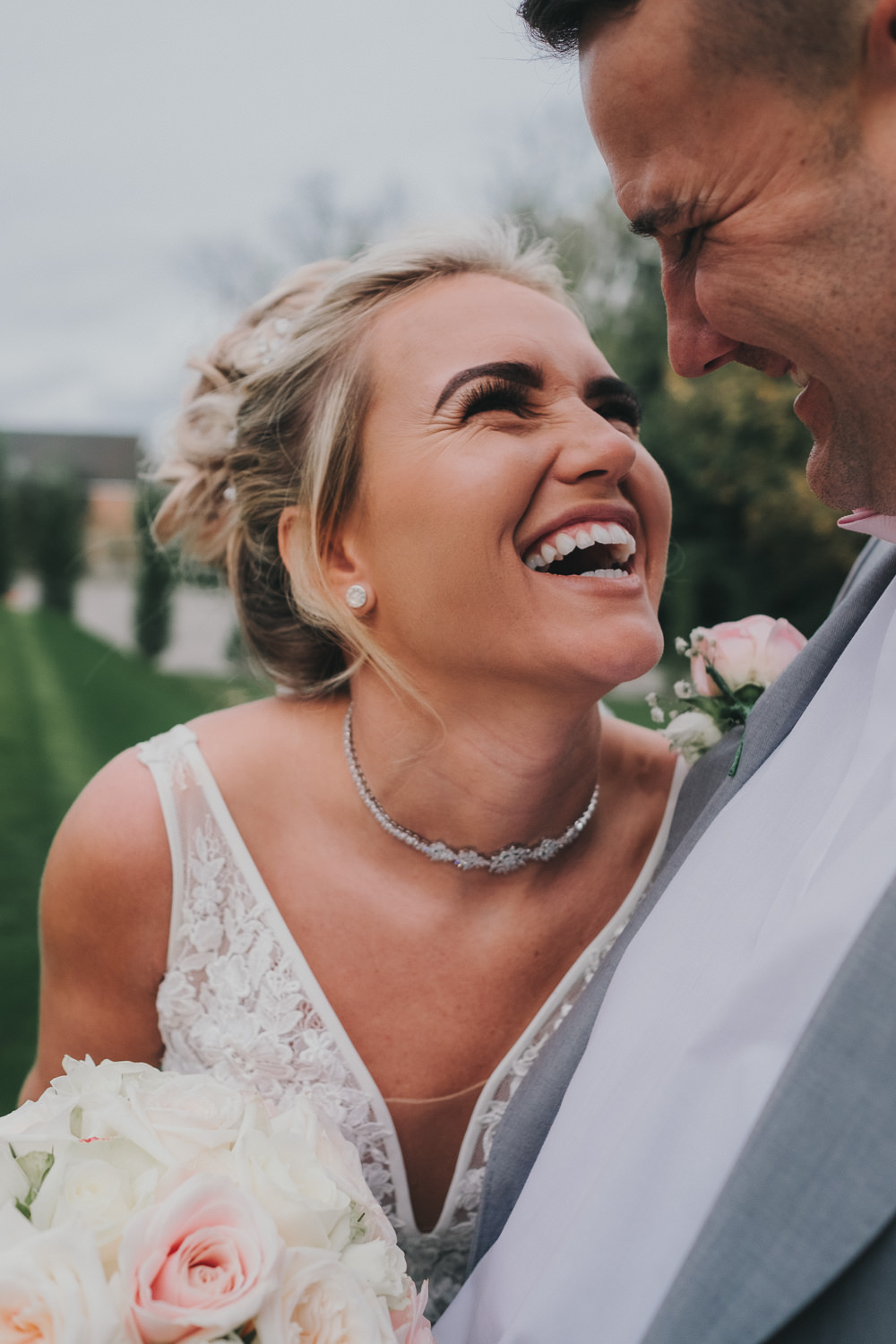 Bride Groom Happy Laughter Classic Traditional Bouquet Bridal Updo Grey Suit | Ashfield House Wedding Kate McCarthy Photography