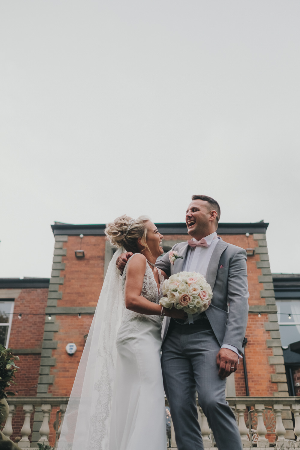 Bride Groom Happy Laughter Classic Traditional Bouquet Bridal Updo Grey Suit | Ashfield House Wedding Kate McCarthy Photography