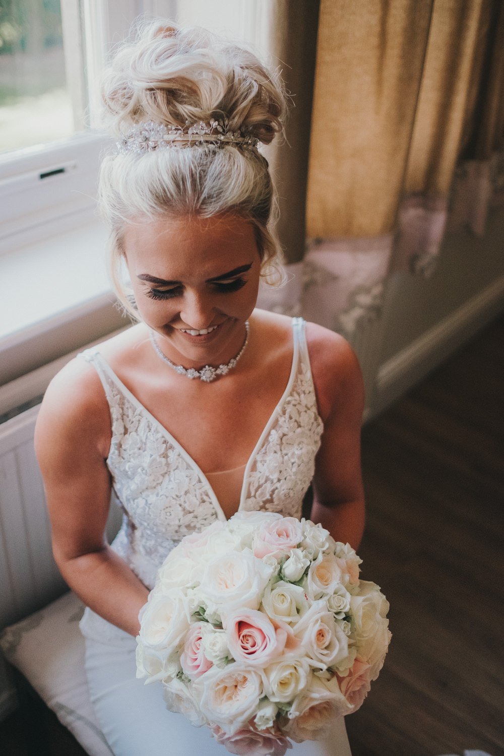Happy Bride Bridal Prep Morning Hair Updo Classic Traditional Elegant Round White Rose Bouquet | Ashfield House Wedding Kate McCarthy Photography
