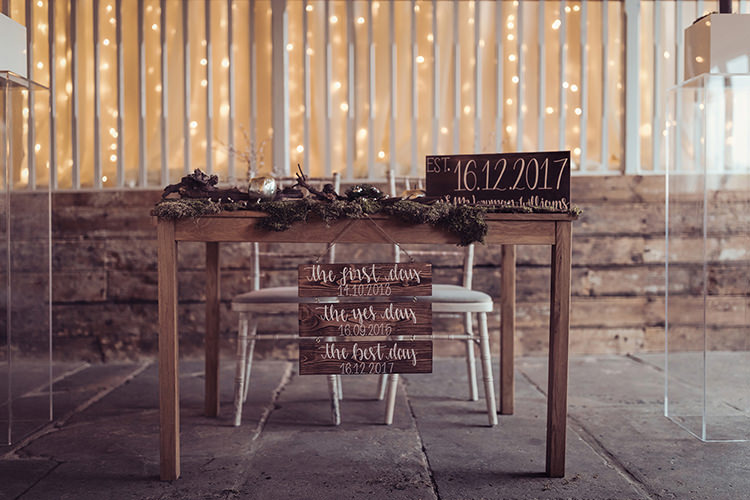 Register Table Hand Painted Personalised Sign Modern Calligraphy Rustic Foliage Moss Magical Wonderland Askham Hall Wedding Winter Tiree Dawson Photography