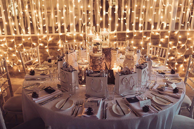 Table Setting Wood Slice Log Gift Bag Pea Fairy Light Magical Wonderland Askham Hall Wedding Winter Tiree Dawson Photography