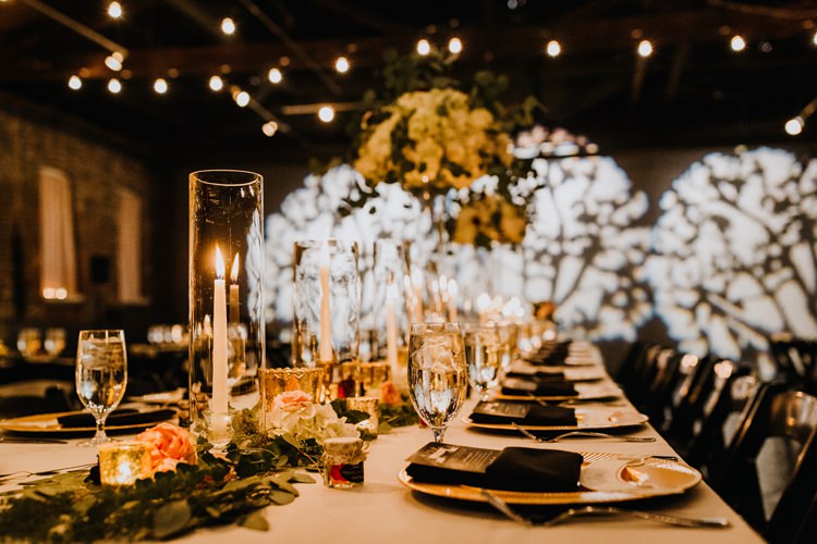 Warehouse Rustic Chic Refined Atlanta King Plow Wedding Table Black Chairs White Flowers Light Show | Boho Industrial Winter Wedding Lunalee Photography