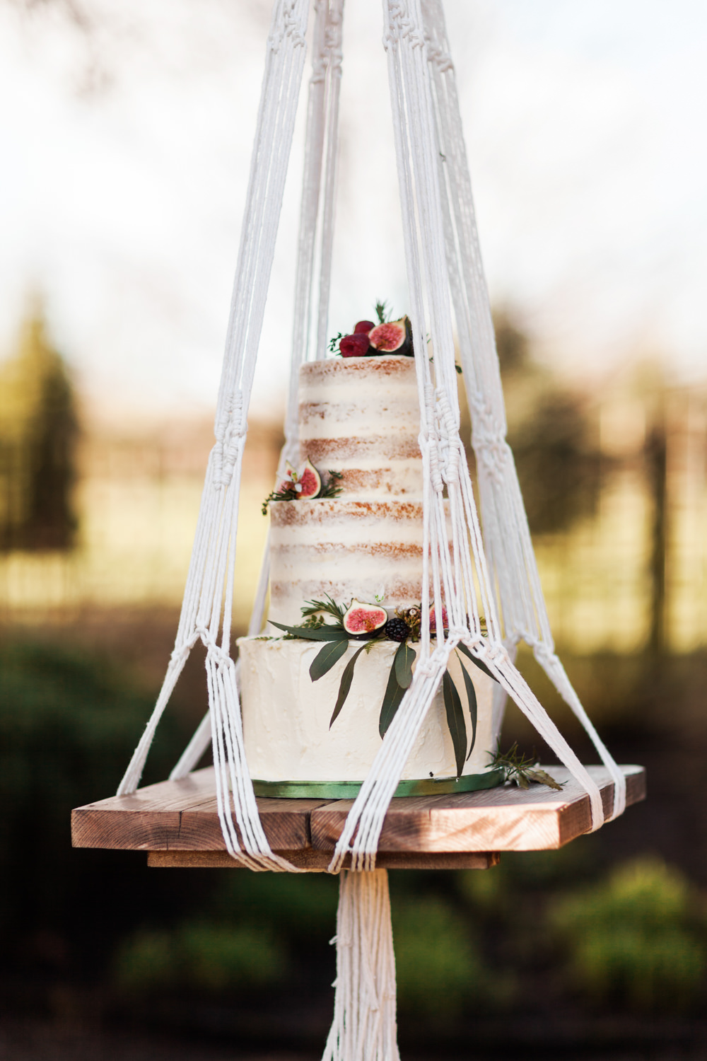 Semi Naked Cake Foliage Buttercream Hanging Suspended Swing Botanical Macrame Glass House Wedding Ideas Jo Bradbury Photography