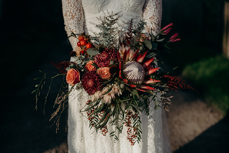 Bouquet Flowers Bride Bridal Red Greenery King Proteas Roses Eucalyptus Astilbe Carnegie Courthouse Wedding Village Hall Scotland Steven Gallagher Photography