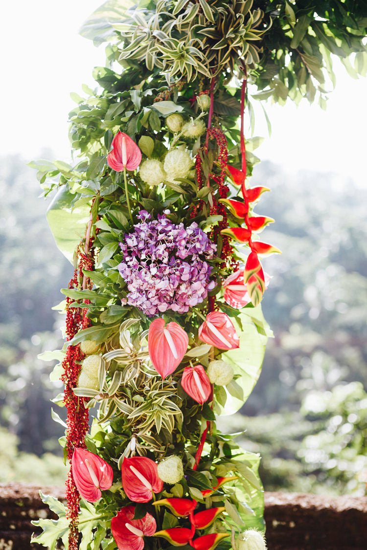 Outdoor Destination Luxury Adventure Ubud Ceremony Tropical Foliage Floral Arch | Whimsical Exotic Tropical Jungle Wedding Bali http://www.cecilephotographybali.com/