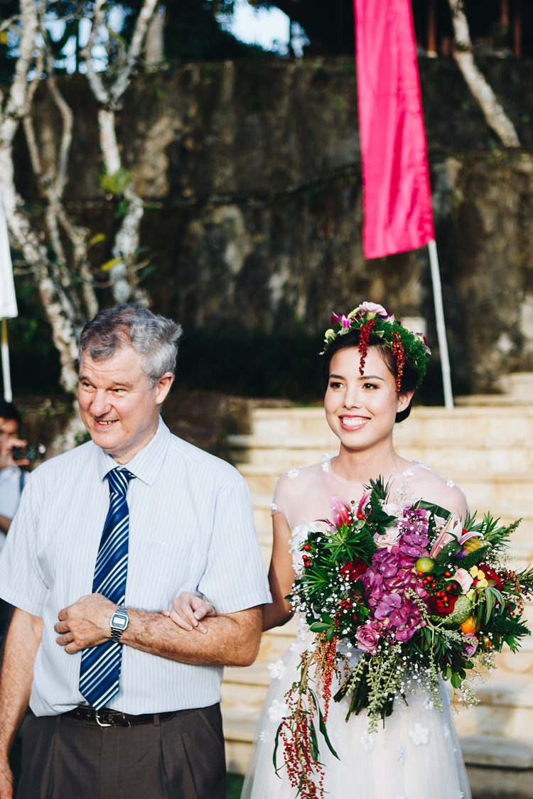 Outdoor Destination Luxury Adventure Ubud Ceremony Bride Colorful Flower Crown Tropical Bouquet | Whimsical Exotic Tropical Jungle Wedding Bali http://www.cecilephotographybali.com/