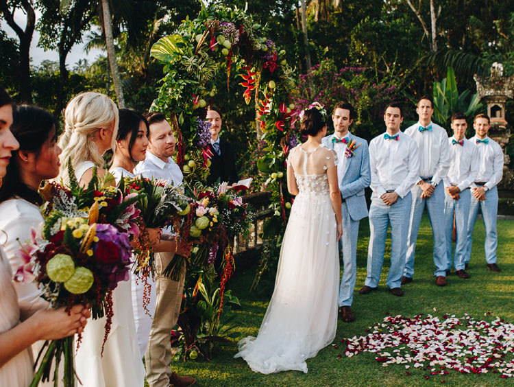Outdoor Destination Luxury Adventure Ubud Ceremony Bride Colorful Bouquet Tropical Floral Arch | Whimsical Exotic Tropical Jungle Wedding Bali http://www.cecilephotographybali.com/