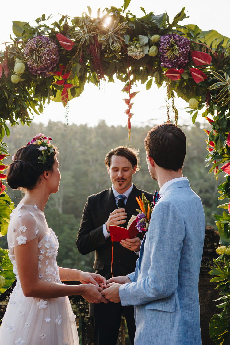 Outdoor Destination Luxury Adventure Ubud Ceremony Bride Colorful Flower Crown Tropical Floral Arch | Whimsical Exotic Tropical Jungle Wedding Bali http://www.cecilephotographybali.com/