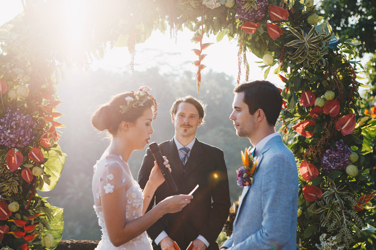 Outdoor Destination Luxury Adventure Ubud Ceremony Bride Colorful Flower Crown Tropical Floral Arch | Whimsical Exotic Tropical Jungle Wedding Bali http://www.cecilephotographybali.com/