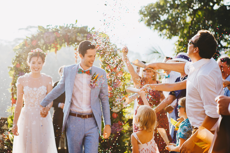 Outdoor Destination Luxury Adventure Ubud Ceremony Bride Colorful Flower Crown Tropical Floral Arch Confetti | Whimsical Exotic Tropical Jungle Wedding Bali http://www.cecilephotographybali.com/