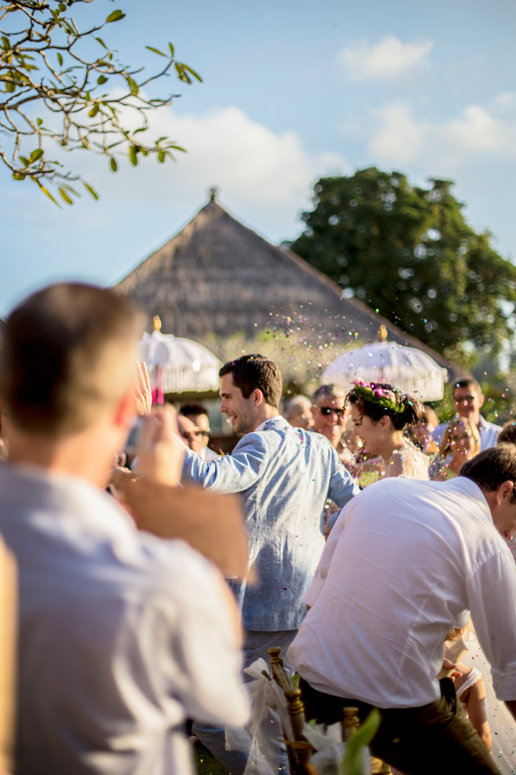 Outdoor Destination Luxury Adventure Ubud Ceremony Bride Colorful Flower Crown Tropical Floral Arch Confetti | Whimsical Exotic Tropical Jungle Wedding Bali http://www.cecilephotographybali.com/